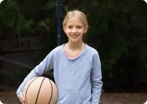 Student with a basket ball