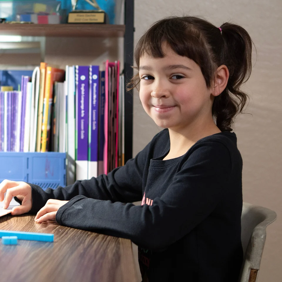 Elementary student smiling